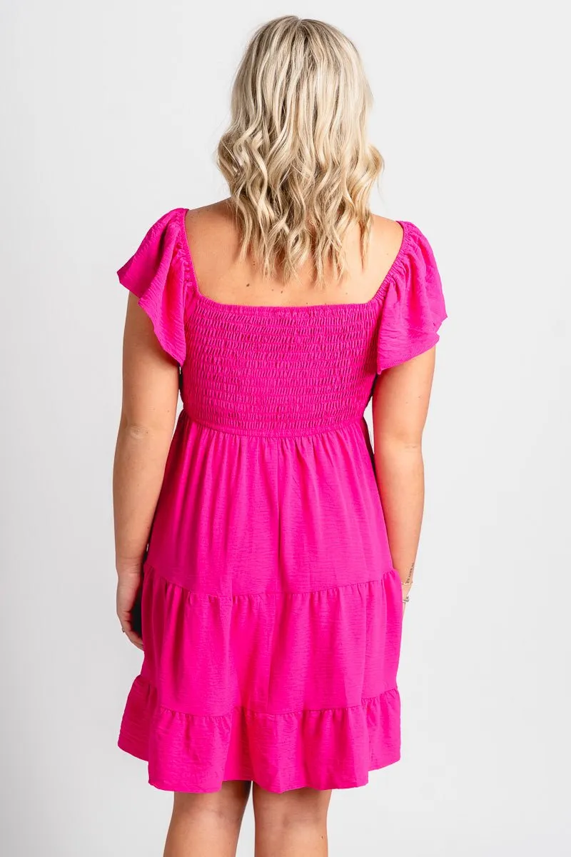 Smocked flutter sleeve dress hot pink